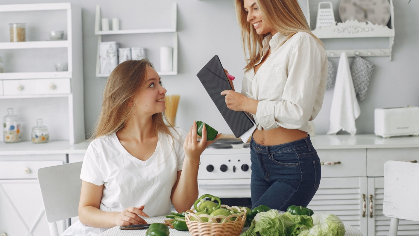 Healthy eating. Dieting and people concept. Blonde with a vegetable.