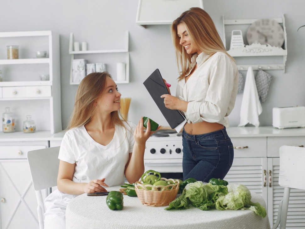 Healthy eating. Dieting and people concept. Blonde with a vegetable.